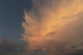 beautiful picture of clouds, feathery clouds in the light of the setting sun, fluffy cloud against the blue sky Royalty Free Stock Photo