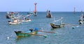 Beautiful picture of fishing boats at Jimbaran Bay at Bali Indonesia, beach, ocean, fishing boats and airport in photo. Royalty Free Stock Photo