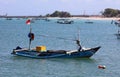 Beautiful picture of fishing boats at Jimbaran Bay at Bali Indonesia, beach, ocean, fishing boats and airport in photo. Royalty Free Stock Photo