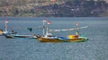 Beautiful picture of fishing boats at Jimbaran Bay at Bali Indonesia, beach, ocean, fishing boats and airport in photo. Royalty Free Stock Photo