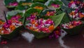 beautiful picture of flowers in leaf bowl
