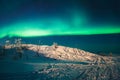 Beautiful picture of massive multicolored green vibrant Aurora Borealis, also known as Northern Lights, Sweden, Lapland Royalty Free Stock Photo