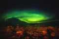 Beautiful picture of massive multicolored green vibrant Aurora Borealis, Aurora Polaris, also know as Northern Lights in Norway Royalty Free Stock Photo