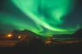 Beautiful picture of massive multicolored green vibrant Aurora Borealis, Aurora Polaris, also know as Northern Lights in Norway