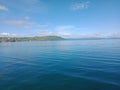 A beautiful picture of ocean and rock and blue wave taken at Lake Toba that located at Medan, Indonesia.