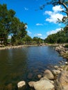 Beautiful picture, river with green forest and blue sky for background