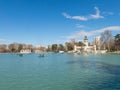 Beautiful picture of tourists on boats at Monument to Alfonso XII in the Parque del Buen Retiro. in Madrid, Spain