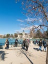 Beautiful picture of tourists at pond of the Parque del Buen Retiro - Park of the Pleasant Retreat in Madrid, Spain