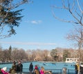 Beautiful picture of tourists at pond of the Parque del Buen Retiro - Park of the Pleasant Retreat in Madrid, Spain