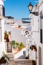 beautiful, picturesque street, narrow road, white facades of buildings, Spanish architecture