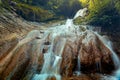 Beautiful and Picturesque Waterfall In Deep Forest In Summer Closeup