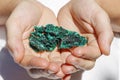 Beautiful piece of Malachite in hands