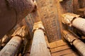 Beautiful pillars and ceiling covered with hieroglyphic carvings in the Hypostyle Hall of the Temple of Hathor in Dendera