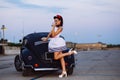 Beautiful pin-up girl posing with hot road car Royalty Free Stock Photo