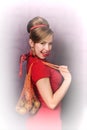 Beautiful pin-up girl in a red dress Royalty Free Stock Photo