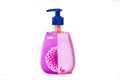 Beautiful pink bottle with a spray flower for soap or shampoo in full one color for advertising Royalty Free Stock Photo