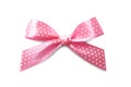 Beautiful pink bow with polka dot pattern Royalty Free Stock Photo