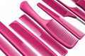 Beautiful pink bright combs for hairdressers on white background. Tools for beauty industry. Set of different hair brush Royalty Free Stock Photo