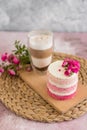 Beautiful pink cream and berries cake on a light concrete background Royalty Free Stock Photo