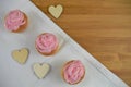 Beautiful pink cupcakes with love heart shapes for a mothers day Royalty Free Stock Photo