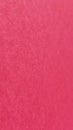 Beautiful pink or fuchsia bright background. Scarlet, purple, uneven color. A sheet of colored paper with a soft fleecy texture