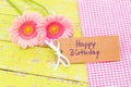 Pastel pink flowers and greeting card Happy Birthday Royalty Free Stock Photo