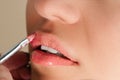 Beautiful pink gloss on lips Royalty Free Stock Photo