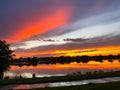 Beautiful pink, orange and blue sunset reflecting on a lake Royalty Free Stock Photo