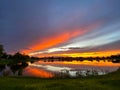 Beautiful pink, orange and blue sunset reflecting on a lake Royalty Free Stock Photo