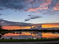 Beautiful pink, orange and blue sunset reflecting on a lake Royalty Free Stock Photo