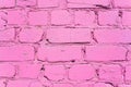 Beautiful pink purple brick wall with white grout, colorful background, abstract texture for copy space. Royalty Free Stock Photo