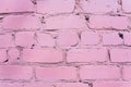 Beautiful pink purple brick wall with white grout, colorful background, abstract texture for copy space. Royalty Free Stock Photo