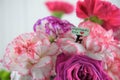 Bouquet of flowers with miniature mothers day note