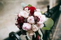 Beautiful pink and red peonies wedding bouquet