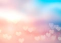 Beautiful pink romantic bokeh. Blurred hearts texture.Valentine`s day background.Glowing love backdrop