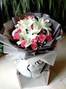 Beautiful pink roses and lily flower bouquet