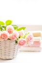 Beautiful, pink roses and towels Royalty Free Stock Photo