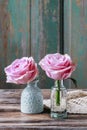 Beautiful pink roses, wooden background Royalty Free Stock Photo