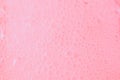 Beautiful pink soap bubbles background, orange and white foam bubble texture
