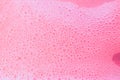 Beautiful pink soap bubbles background, orange and white foam bubble texture Royalty Free Stock Photo