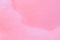 Beautiful pink soap bubbles background, orange and white foam bubble texture Royalty Free Stock Photo