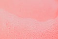 Beautiful pink soap bubbles background, orange and white foam bubble texture