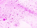 Beautiful pink soap bubbles background, orange and white foam bubble texture Royalty Free Stock Photo
