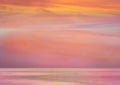 Beautiful pink sunset at sea  water reflection sun light on  gold yellow  clouds sky  nature background Royalty Free Stock Photo