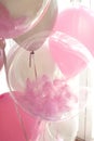 Beautiful pink and transparent balloons. blur, selective focus