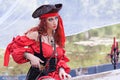 Beautiful Pirate Woman on Small Boat with Pirate Hat Royalty Free Stock Photo