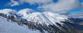 Beautiful Pirin mountains peaks covered with snow. Winter panoramic view at Bansko ski resort in Bulgaria Royalty Free Stock Photo