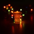 Plastic pot object with lights background photograph Royalty Free Stock Photo