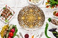 Beautiful plate in center of food, void, flat lay