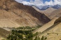Beautiful play of light on the valley of Basgo, snow capped Himalayan mountains in the background. Leh, Union territory of Ladakh